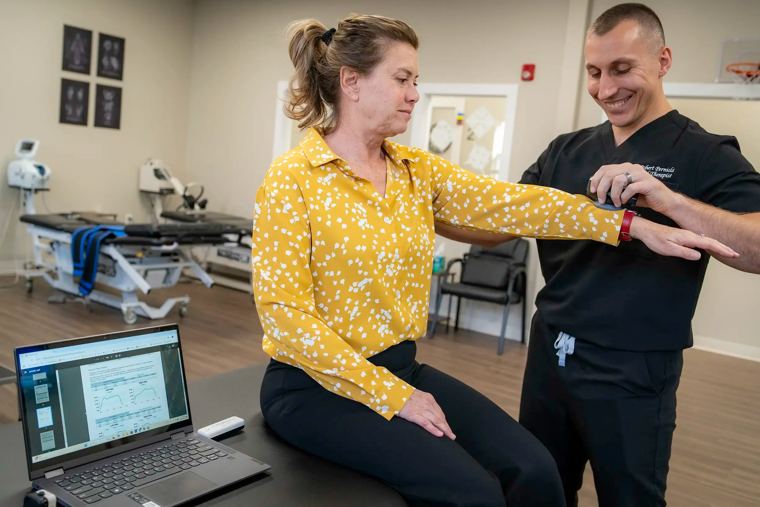 Limitless Healthcare Team adjusts a patient's knee brace during post operative care at Limitless Spine & Joint Care, ensuring proper support and alignment.