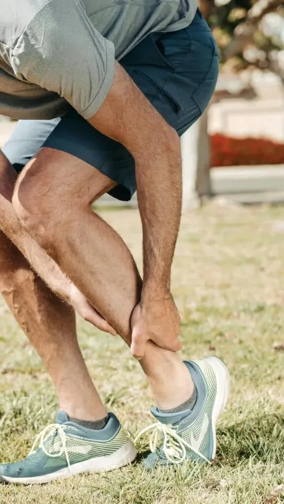 Close-up of bare feet on a neutral background, illustrating a discussion of foot and ankle pain causes and treatment at Limitless Spine & Joint Care.